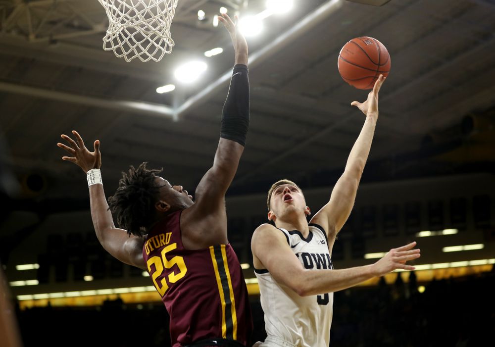 Iowa Hawkeyes guard CJ Fredrick (5) goes to the hoop against the Minnesota Golden Gophers Monday, December 9, 2019 at Carver-Hawkeye Arena. (Brian Ray/hawkeyesports.com)