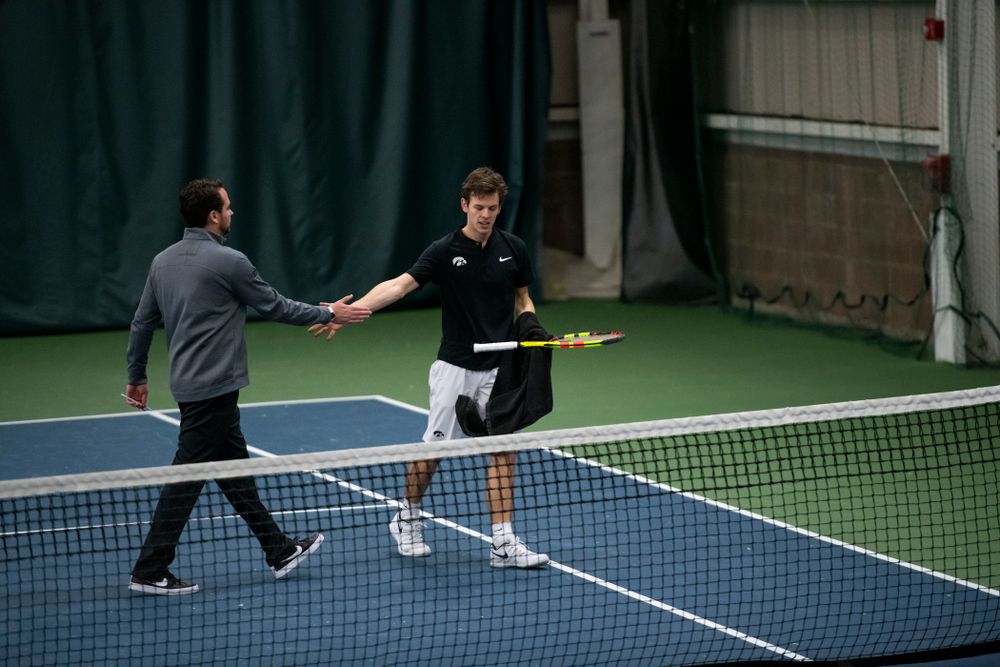 The Iowa men's tennis team competes against Cornell in The Rise Tennis Center in Ithaca, NY on Sunday, Feb. 24, 2019.
