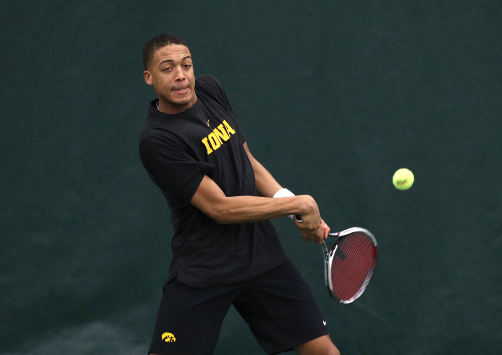 Will Davies and Oliver Okonkwo plays a doubles match against the Miami Hurricanes Friday, February 8, 2019 at the Hawkeye Tennis and Recreation Complex. (Brian Ray/hawkeyesports.com)