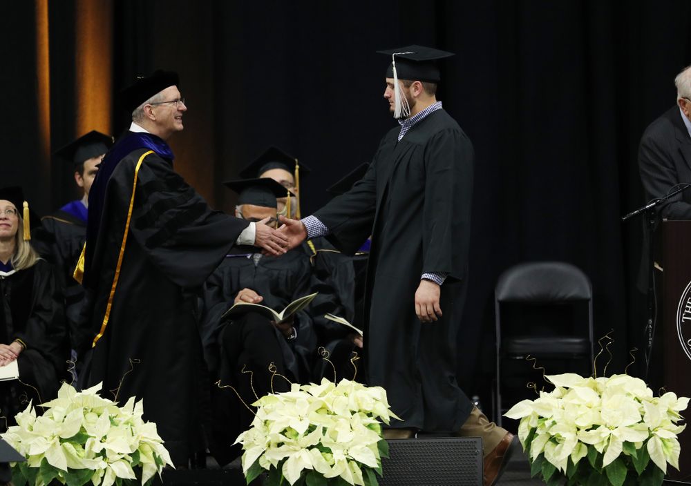 Iowa Football's Ross Reynolds during the Fall Commencement Ceremony Saturday, December 15, 2018 at Carver-Hawkeye Arena. (Brian Ray/hawkeyesports.com)