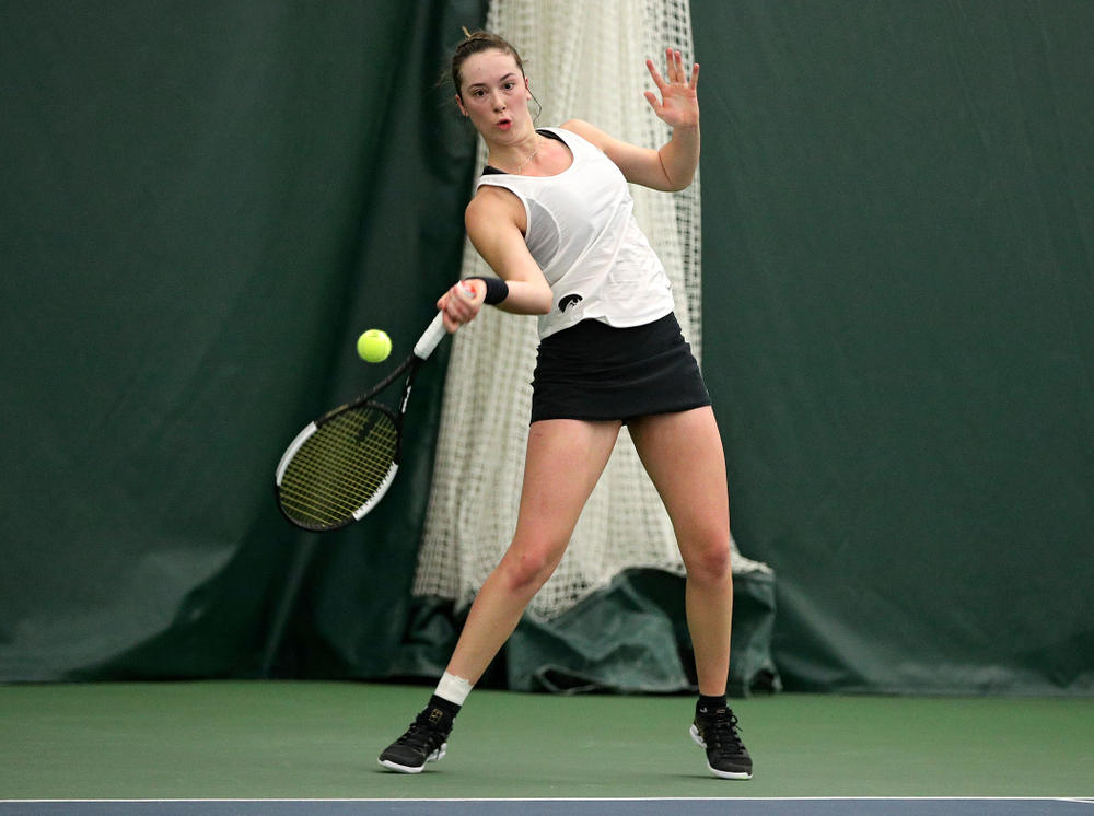 Iowa’s Samantha Mannix returns a shot during her singles match at the Hawkeye Tennis and Recreation Complex in Iowa City on Sunday, February 23, 2020. (Stephen Mally/hawkeyesports.com)