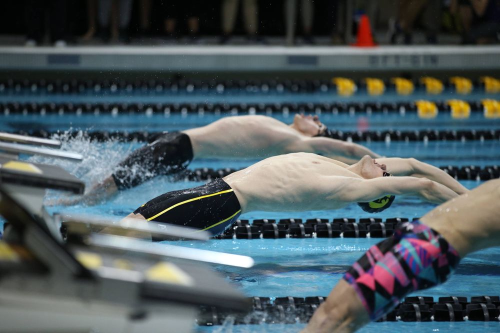 The Iowa A team competes in the 200-yard medley relay at the 2019 Big Ten Swimming and Diving meet Wednesday, February 27, 2019 at the Campus Wellness and Recreation Center. (Lily Smith/hawkeyesports.com)