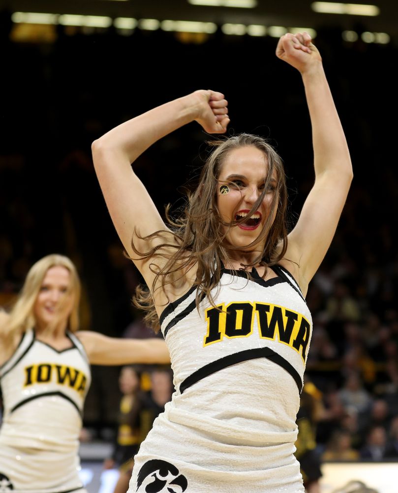 The Iowa Cheerleaders and Dance Team perform on senior night at half-time of the Iowa Hawkeyes game against the Purdue Boilermakers Tuesday, March 3, 2020 at Carver-Hawkeye Arena. (Brian Ray/hawkeyesports.com)