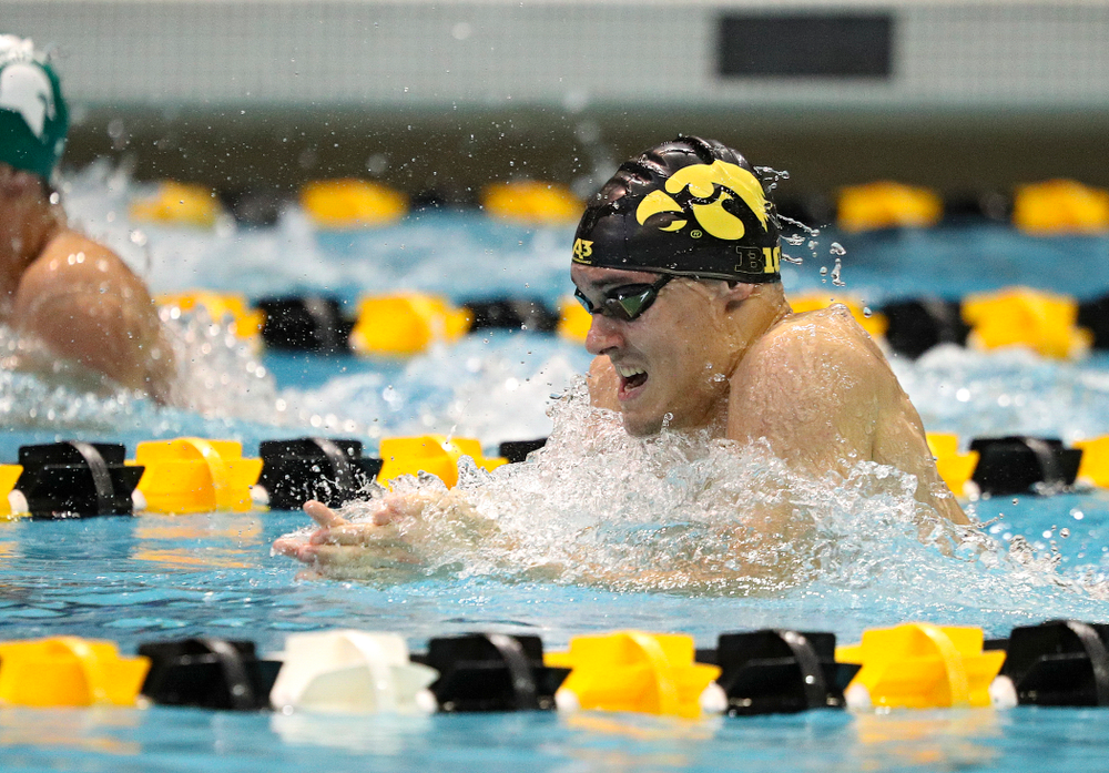 Iowa’s Daniel Swanepoel swims the men’s 100-yard breaststroke event during their meet against Michigan State and Northern Iowa at the Campus Recreation and Wellness Center in Iowa City on Friday, Oct 4, 2019. (Stephen Mally/hawkeyesports.com)