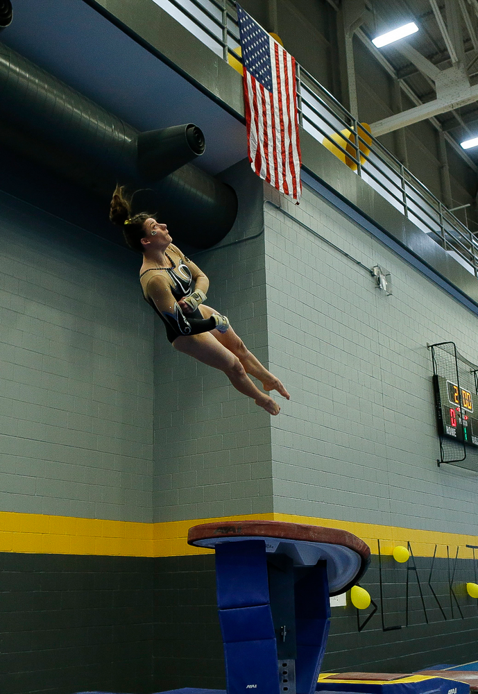 Lanie Snyder competes on the vault during the Black and Gold Intrasquad meet at the Field House on 12/2/17. (Tork Mason/hawkeyesports.com)