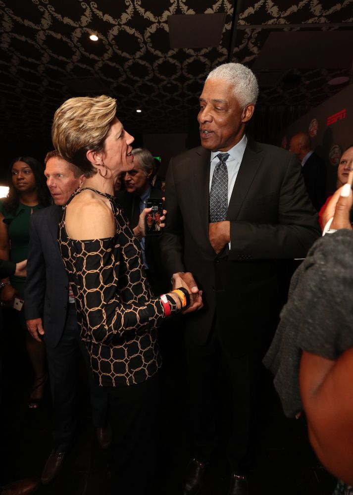 Iowa Hawkeyes associate head coach Jan Jensen with NBA great Julius Erving before the ESPN College Basketball Awards show Friday, April 12, 2019 at The Novo at LA Live. (Brian Ray/hawkeyesports.com)