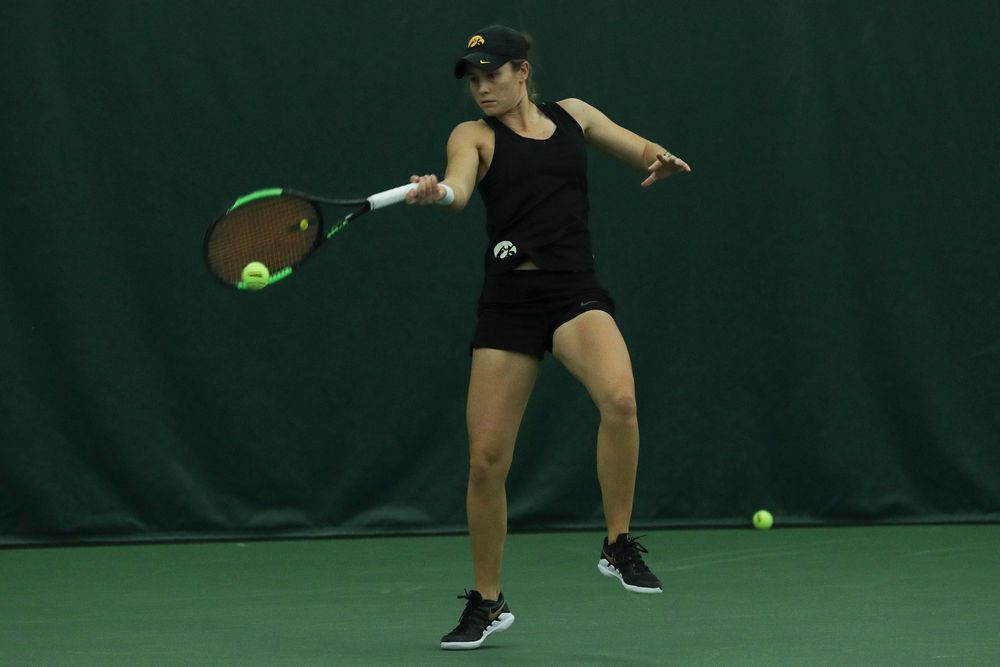 Iowa’s Elise van Heuvelen during the Iowa women’s tennis meet vs DePaul on Friday, February 21, 2020 at the Hawkeye Tennis and Recreation Complex. (Lily Smith/hawkeyesports.com)