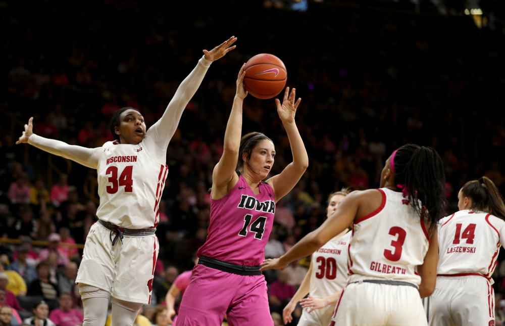 Iowa Hawkeyes forward McKenna Warnock (14) against the Wisconsin Badgers Sunday, February 16, 2020 at Carver-Hawkeye Arena. (Brian Ray/hawkeyesports.com)