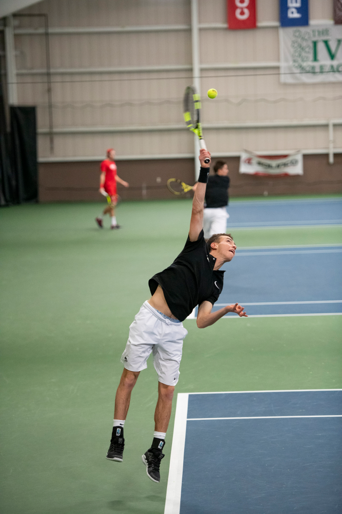 The Iowa men's tennis team competes against Cornell in The Rise Tennis Center in Ithaca, NY on Sunday, Feb. 24, 2019.