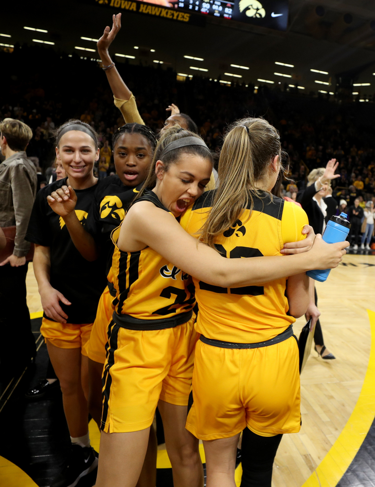 Iowa Hawkeyes guard Gabbie Marshall (24) and guard Kathleen Doyle (22) against the Minnesota Golden Gophers Thursday, February 27, 2020 at Carver-Hawkeye Arena. (Brian Ray/hawkeyesports.com)