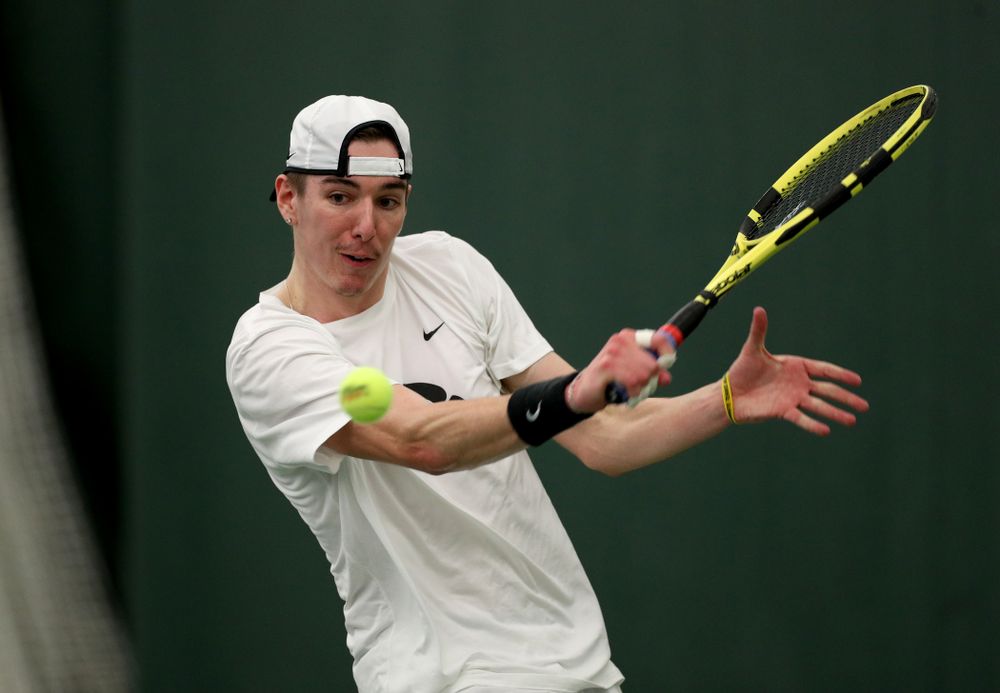 Iowa’s Nikita Snezhko against Cornell Sunday, March 8, 2020 at the Hawkeye Tennis and Recreation Center. (Brian Ray/hawkeyesports.com)