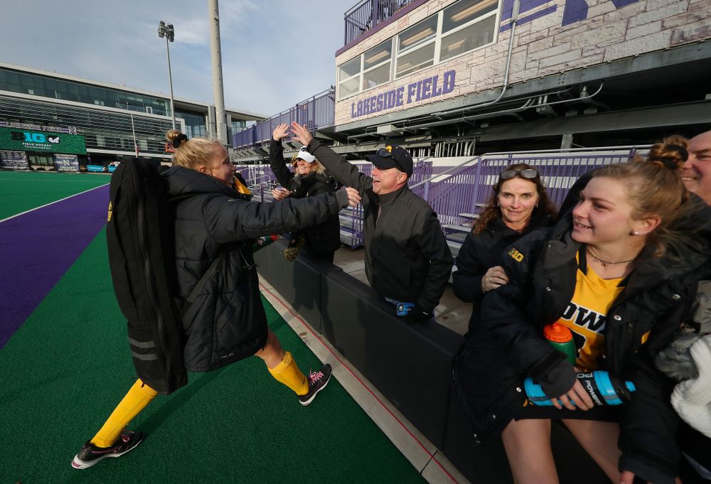 Iowa Hawkeyes Makenna Grewe (4) hugs her family after their 2-1 victory over the Michigan Wolverines in the semi-finals of the Big Ten Tournament Friday, November 2, 2018 at Lakeside Field on the campus of Northwestern University in Evanston, Ill. (Brian Ray/hawkeyesports.com)