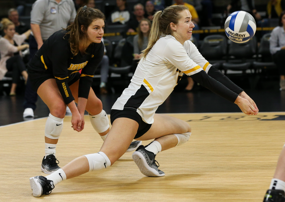 Iowa Hawkeyes outside hitter Meghan Buzzerio (5) digs the ball during a game against Purdue at Carver-Hawkeye Arena on October 13, 2018. (Tork Mason/hawkeyesports.com)