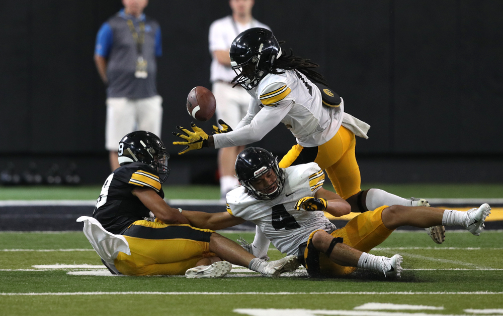 Iowa Hawkeyes defensive back Devonte Young (17) and defensive back Dane Belton (4) During Fall Camp Practice No. 6 Thursday, August 8, 2019 at the Ronald D. and Margaret L. Kenyon Football Practice Facility. (Brian Ray/hawkeyesports.com)