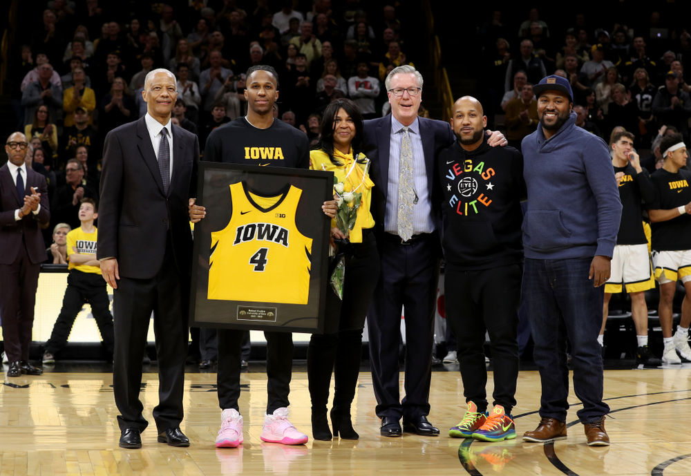 Iowa Hawkeyes guard Bakari Evelyn (4) and his family during senior night festivities before their game against the Purdue Boilermakers Tuesday, March 3, 2020 at Carver-Hawkeye Arena. (Brian Ray/hawkeyesports.com)