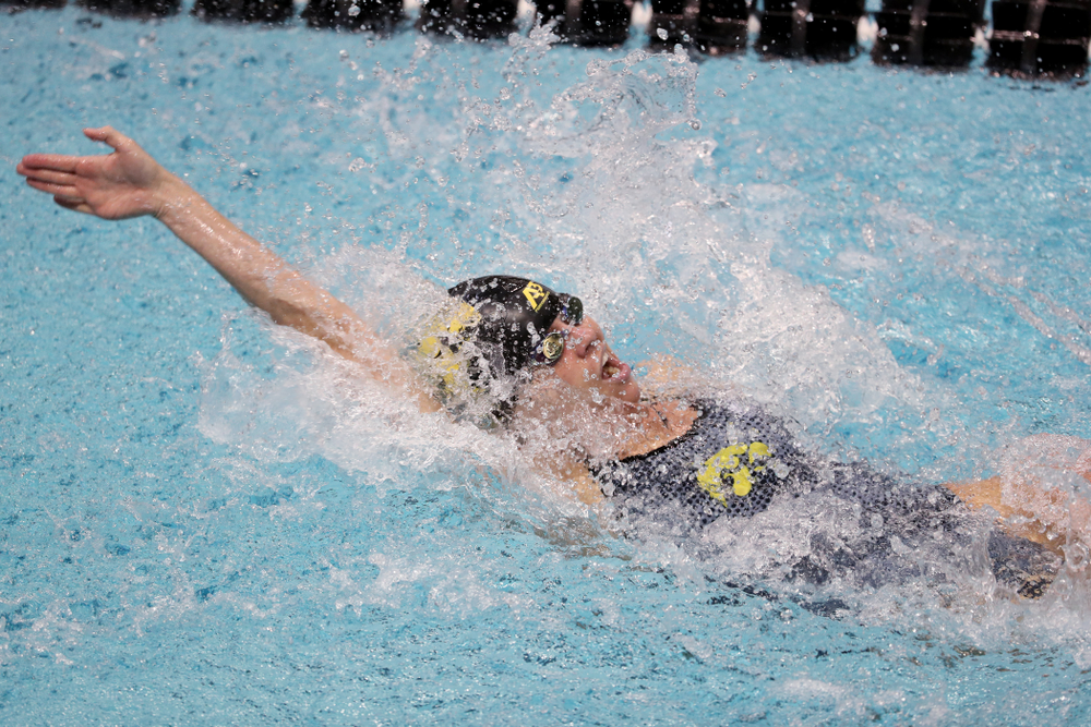 IowaÕs Kennedy Gilbertson swims the backstroke leg of the 200 Medley Relay against Notre Dame and Illinois Saturday, January 11, 2020 at the Campus Recreation and Wellness Center. (Brian Ray/hawkeyesports.com)