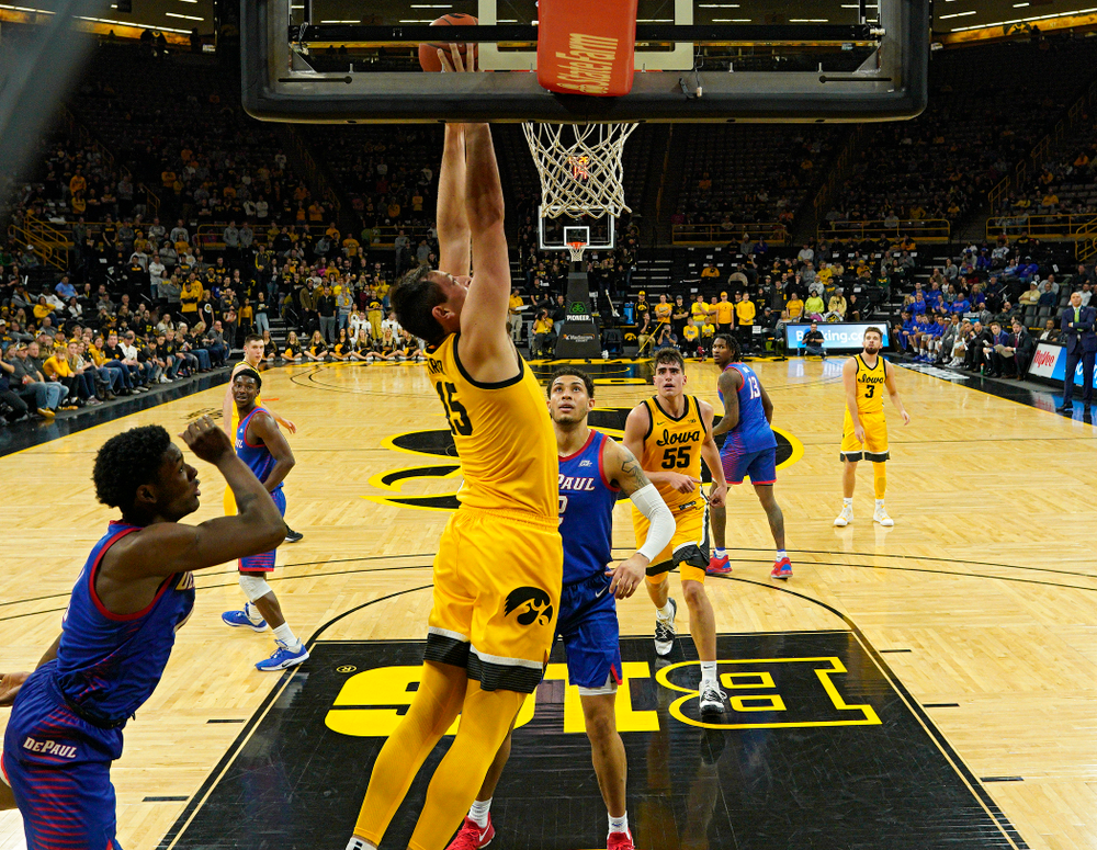 Iowa Hawkeyes forward Ryan Kriener (15) dunks the ball during the second half of their game at Carver-Hawkeye Arena in Iowa City on Monday, Nov 11, 2019. (Stephen Mally/hawkeyesports.com)