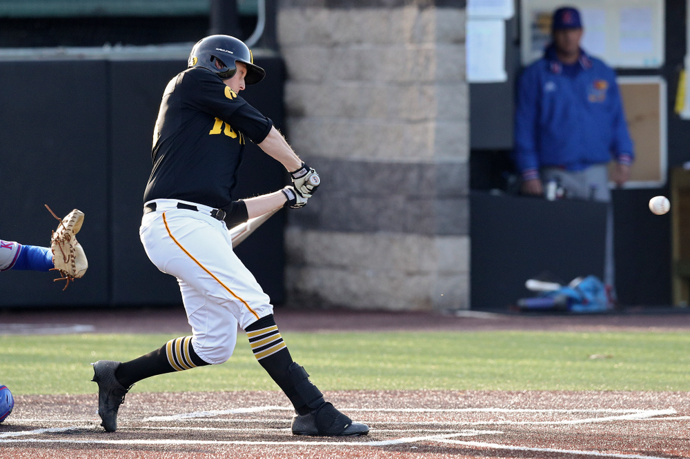 Iowa designated hitter Trenton Wallace (38) hits an RBI double during the third inning of their college baseball game at Duane Banks Field in Iowa City on Tuesday, March 10, 2020. (Stephen Mally/hawkeyesports.com)