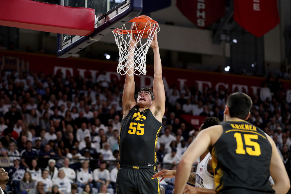 Iowa Hawkeyes forward Luka Garza (55) dunks the ball against Penn State Saturday, January 4, 2020 at the Palestra in Philadelphia. (Brian Ray/hawkeyesports.com)