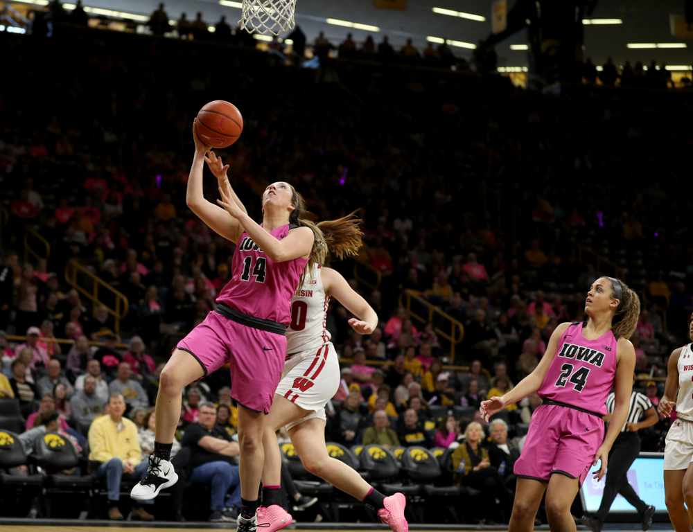 Iowa Hawkeyes forward McKenna Warnock (14) against the Wisconsin Badgers Sunday, February 16, 2020 at Carver-Hawkeye Arena. (Brian Ray/hawkeyesports.com)