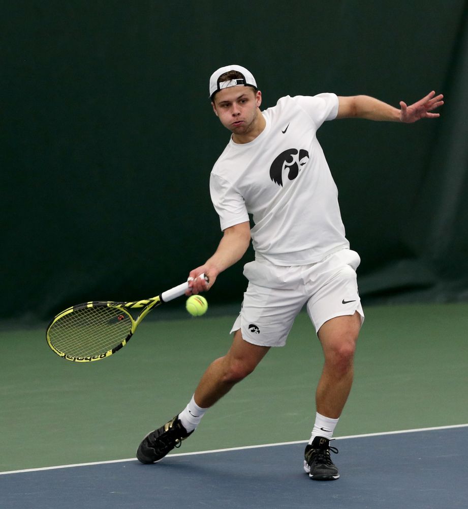 Iowa’s Will Davies against Cornell Sunday, March 8, 2020 at the Hawkeye Tennis and Recreation Center. (Brian Ray/hawkeyesports.com)