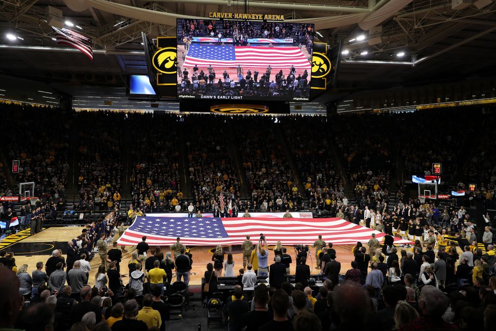 Members of the Iowa Army ROTC display a large American flag before the Iowa Hawkeyes game against Penn State Saturday, February 29, 2020 at Carver-Hawkeye Arena. (Brian Ray/hawkeyesports.com)