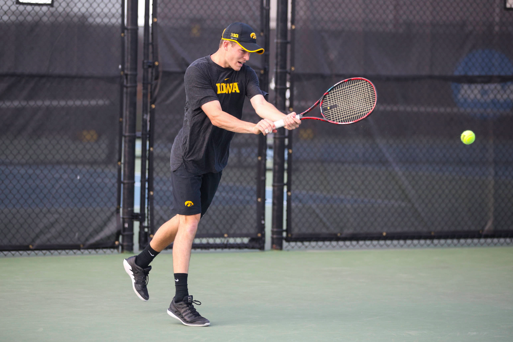 IowaÕs Jonas Larsen at tennis vs Illinois State on Sunday, April 21, 2019 at the Hawkeye Tennis and Recreation Complex. (Lily Smith/hawkeyesports.com)