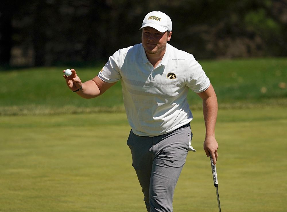 Iowa's Alex Schaake holds up his ball after finishing his first round of the Hawkeye Invitational at Finkbine Golf Course in Iowa City on Saturday, Apr. 20, 2019. (Stephen Mally/hawkeyesports.com)
