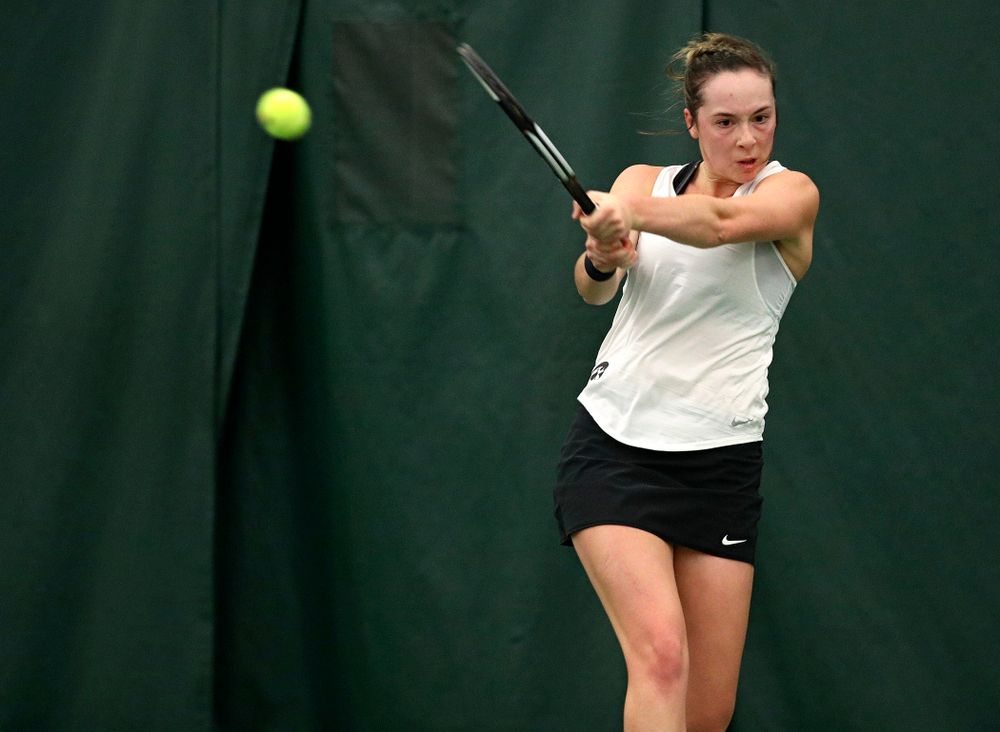 Iowa’s Samantha Mannix returns a shot during her singles match at the Hawkeye Tennis and Recreation Complex in Iowa City on Sunday, February 23, 2020. (Stephen Mally/hawkeyesports.com)