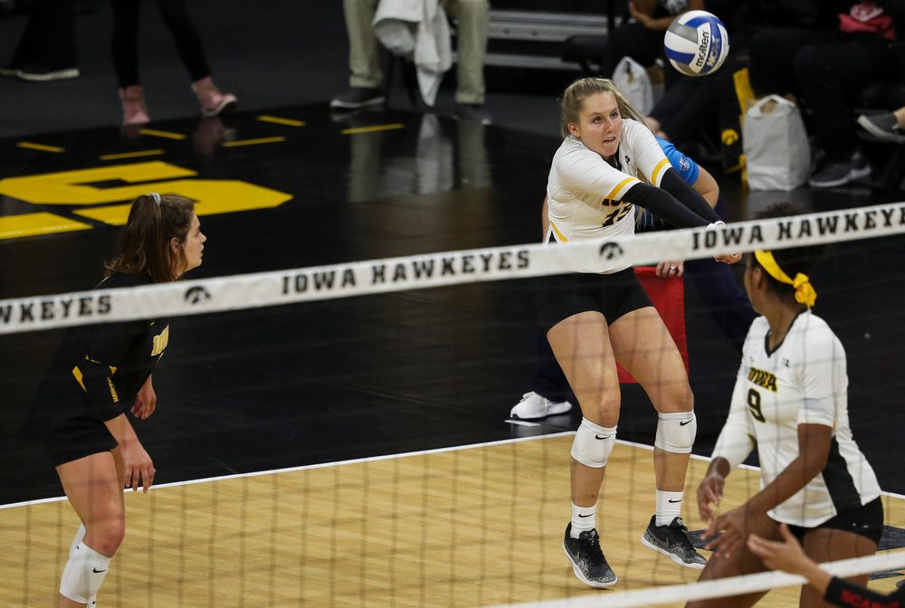 Iowa Hawkeyes defensive specialist Maddie Slagle (15) bumps the ball during a match against Rutgers at Carver-Hawkeye Arena on November 2, 2018. (Tork Mason/hawkeyesports.com)