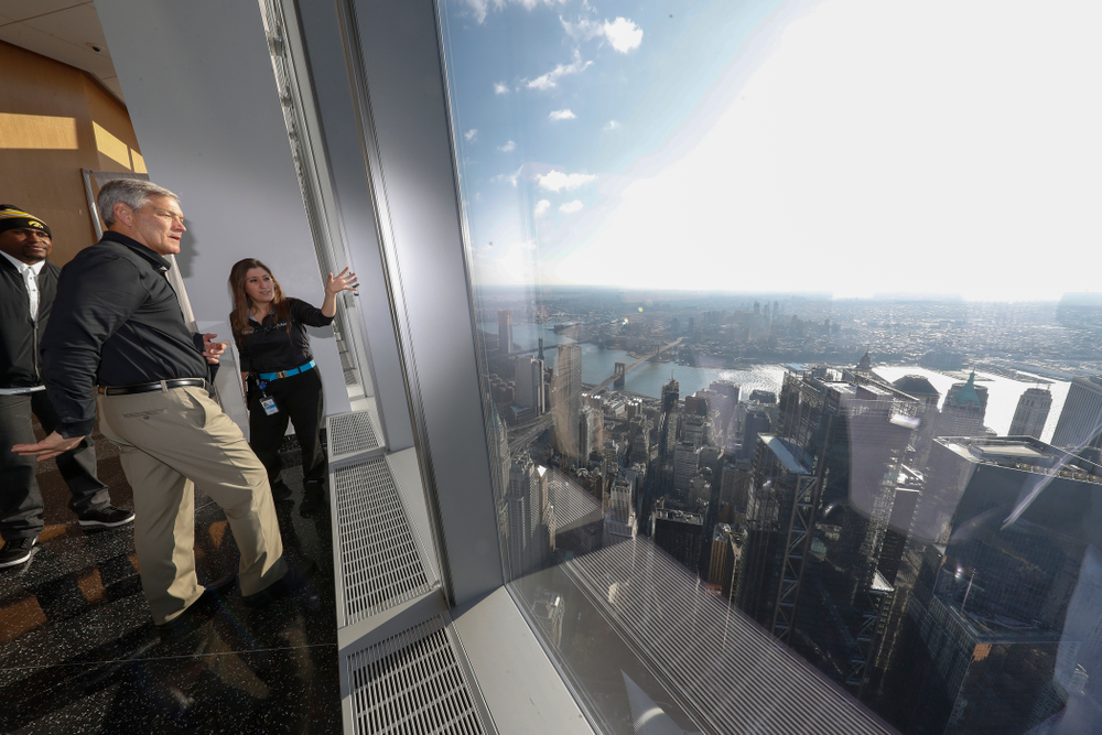 Iowa Hawkeyes head coach Kirk Ferentz as the team visits the observation deck of the One World Trade Center and the 9/11 Memorial and Museum.