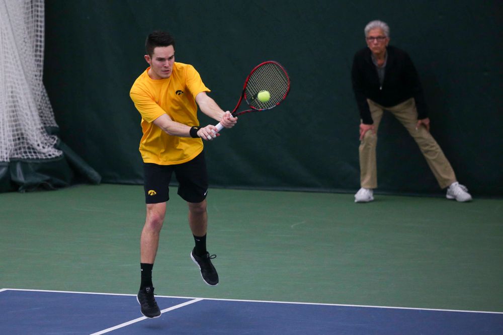 Iowa's Jonas Larsen at a tennis match vs Drake Friday, March 8, 2019 at the Hawkeye Tennis and Recreation Complex. (Lily Smith/hawkeyesports.com)