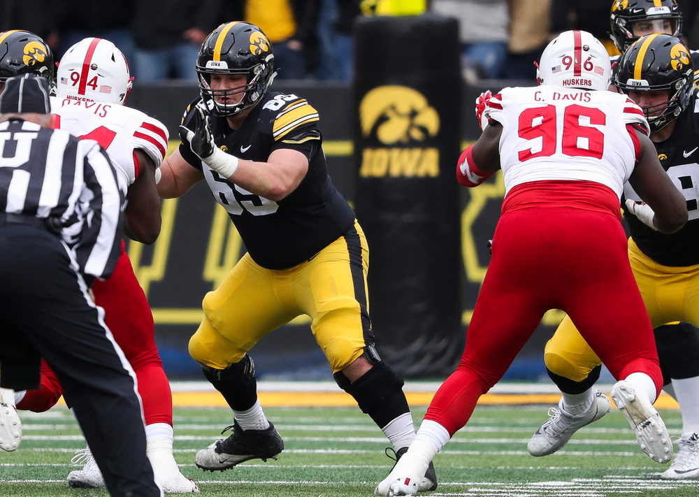 Iowa Hawkeyes offensive lineman Keegan Render (69) pass blocks during a game against Nebraska at Kinnick Stadium on November 23, 2018. (Tork Mason/hawkeyesports.com)