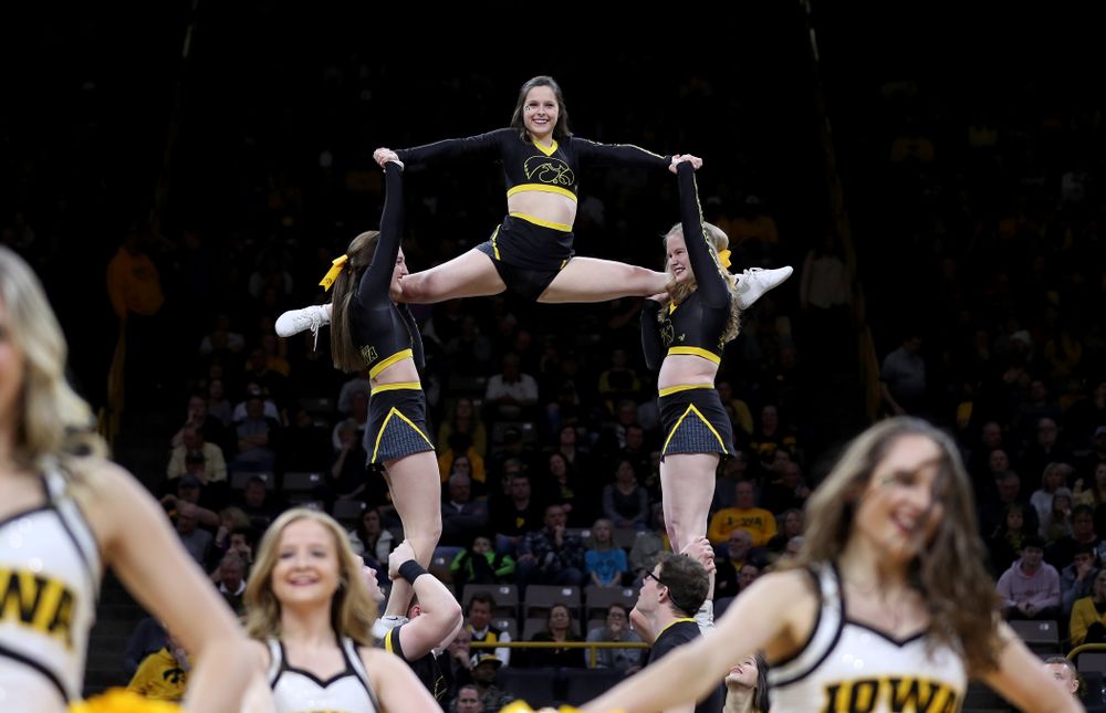The Iowa Cheerleaders and Dance Team perform on senior night at half-time of the Iowa Hawkeyes game against the Purdue Boilermakers Tuesday, March 3, 2020 at Carver-Hawkeye Arena. (Brian Ray/hawkeyesports.com)