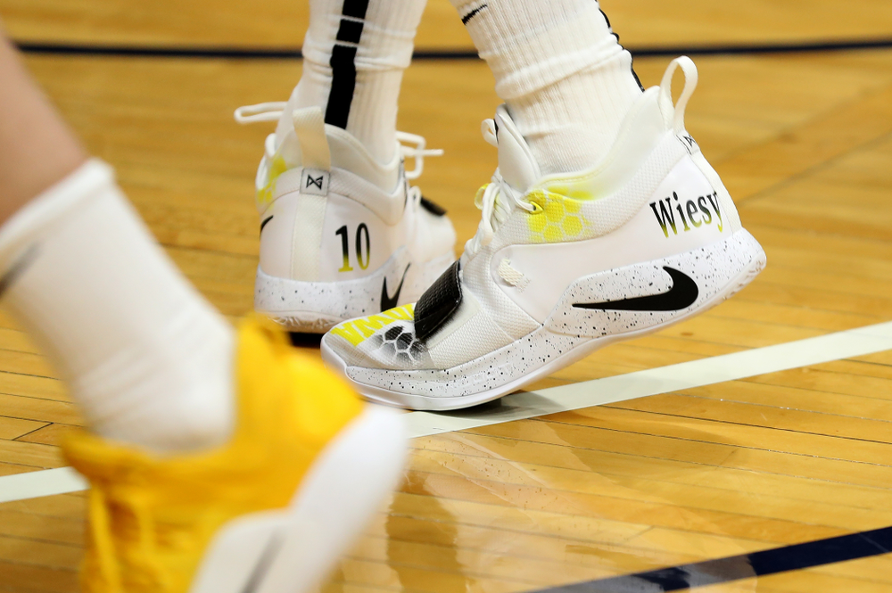Iowa Hawkeyes guard Joe Wieskamp (10) sports custom painted shoes during practice at Hinkle Fieldhouse Wednesday, March 11, 2020 in Indianapolis. (Brian Ray/hawkeyesports.com)