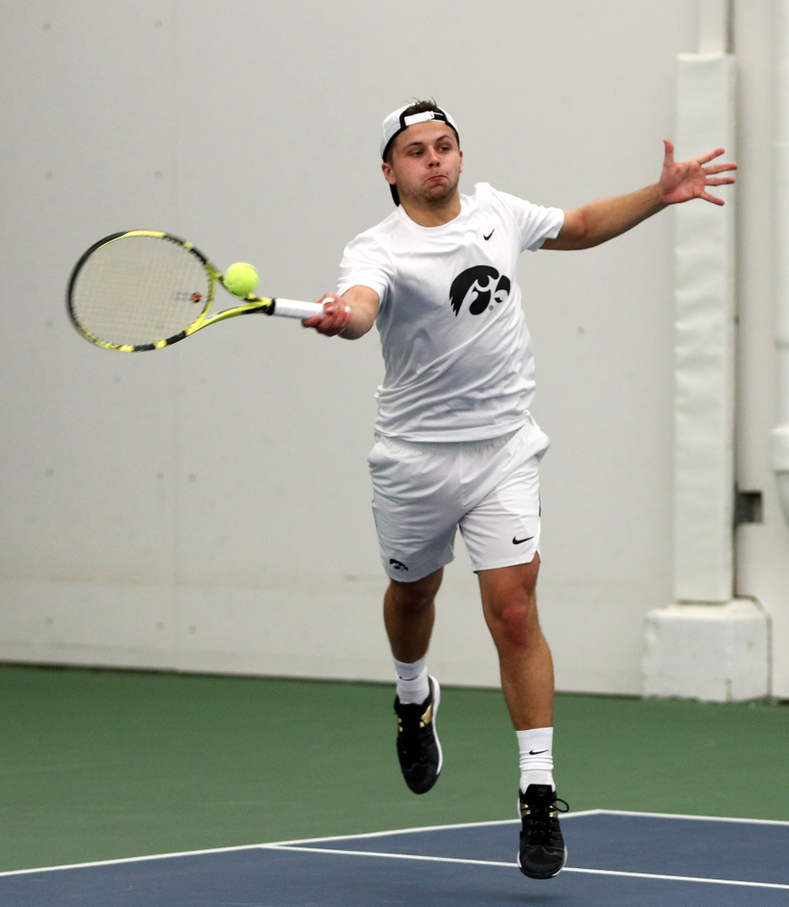 Iowa’s Will Davies against Cornell Sunday, March 8, 2020 at the Hawkeye Tennis and Recreation Center. (Brian Ray/hawkeyesports.com)