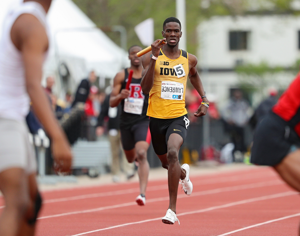 Iowa's Wayne Lawrence Jr. runs his section of the 1600 meter relay event on the third day of the Big Ten Outdoor Track and Field Championships at Francis X. Cretzmeyer Track in Iowa City on Sunday, May. 12, 2019. (Stephen Mally/hawkeyesports.com)