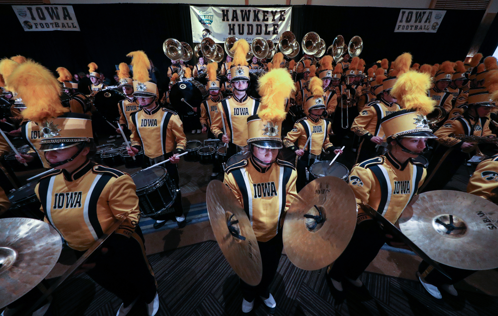 The Hawkeye Marching Band and the Iowa Spirit Squads perform during the Holiday Bowl Hawkeye Huddle Thursday, December 26, 2019 at the Hilton in downtown San Diego. (Brian Ray/hawkeyesports.com)