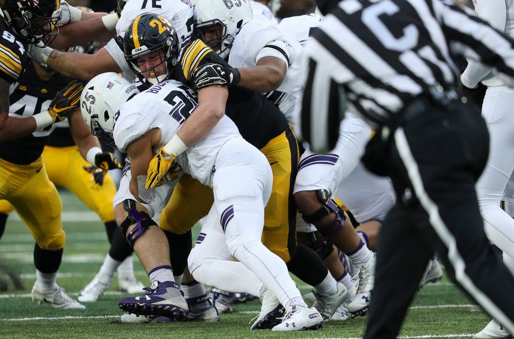 Iowa Hawkeyes defensive lineman Brady Reiff (91) makes a tackle during a game against Northwestern at Kinnick Stadium on November 10, 2018. (Tork Mason/hawkeyesports.com)