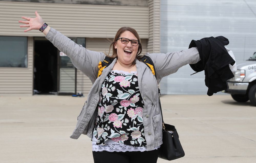 Sports information director Brandee Britt boards the team plane to Greensboro, NC for the Regionals of the 2019 NCAA Women's Basketball Championships Thursday, March 28, 2019 at the Eastern Iowa Airport. (Brian Ray/hawkeyesports.com)