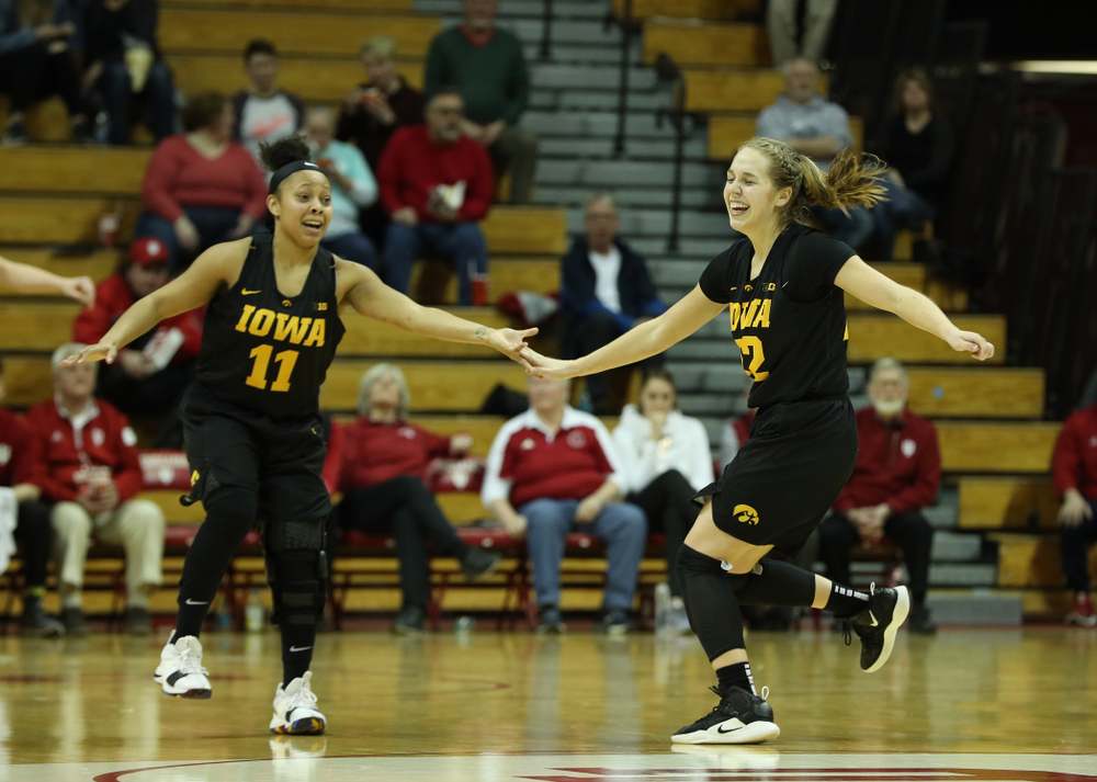 Iowa Hawkeyes guard Kathleen Doyle (22) and guard Tania Davis (11) against the Indiana Hoosiers Thursday, February 21, 2019 at Simon Skjodt Assembly Hall. (Brian Ray/hawkeyesports.com)
