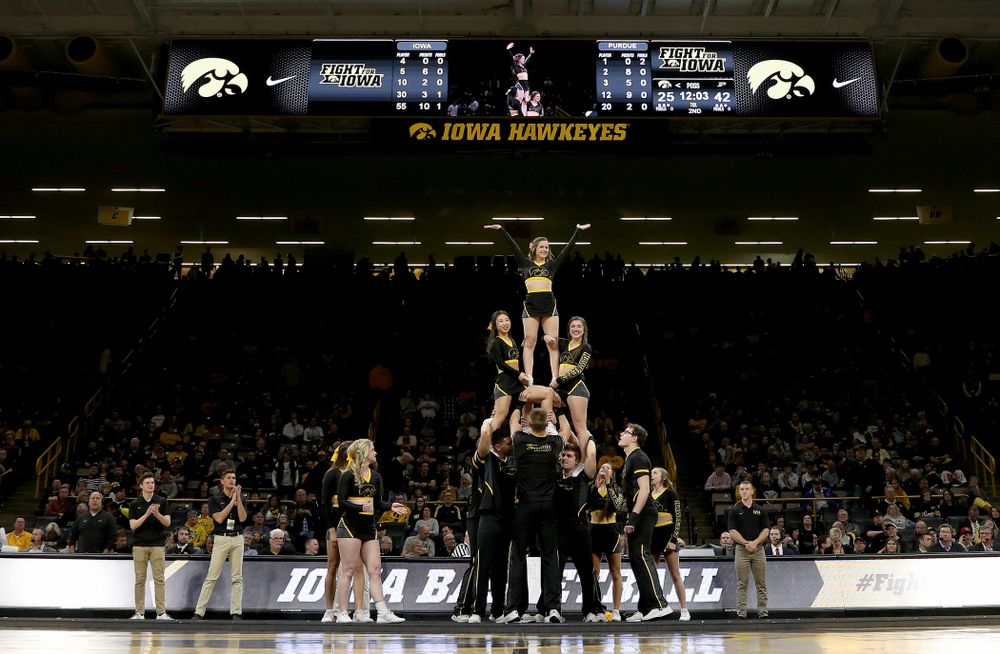 The Iowa Cheerleaders and Dance Team perform on senior night at half-time of the Iowa Hawkeyes game against the Purdue Boilermakers Tuesday, March 3, 2020 at Carver-Hawkeye Arena. (Brian Ray/hawkeyesports.com)