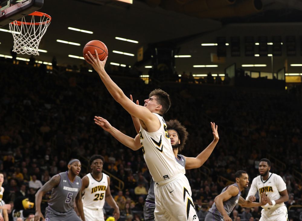 Iowa Hawkeyes forward Luka Garza (55) against the Northwestern Wildcats Sunday, February 10, 2019 at Carver-Hawkeye Arena. (Brian Ray/hawkeyesports.com)