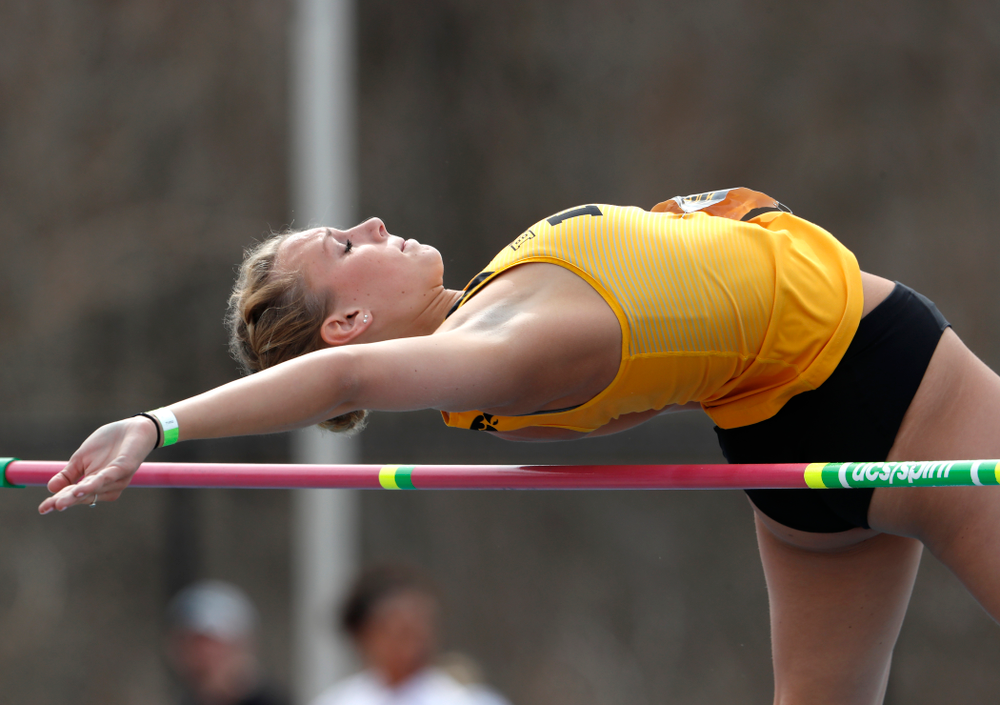 Iowa's Gillian Urycki competes in the high jump during the 2018 MUSCO Twilight Invitational Thursday, April 12, 2018 at the Cretzmeyer Trac