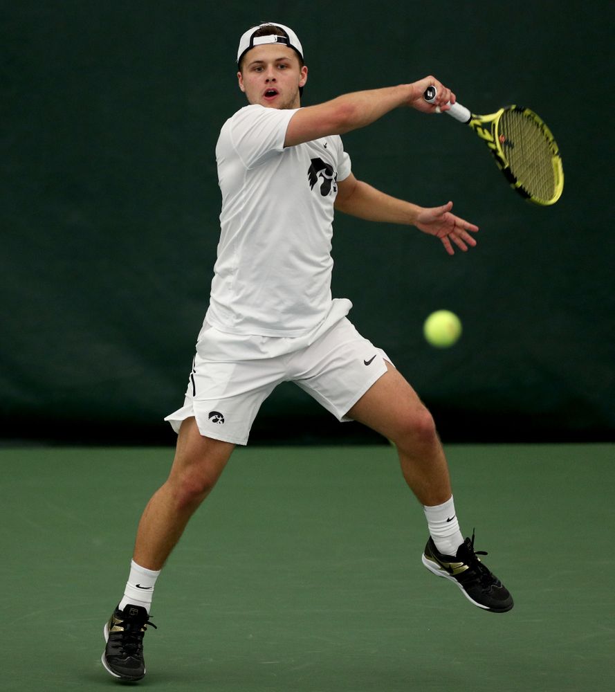 Iowa’s Will Davies against Cornell Sunday, March 8, 2020 at the Hawkeye Tennis and Recreation Center. (Brian Ray/hawkeyesports.com)