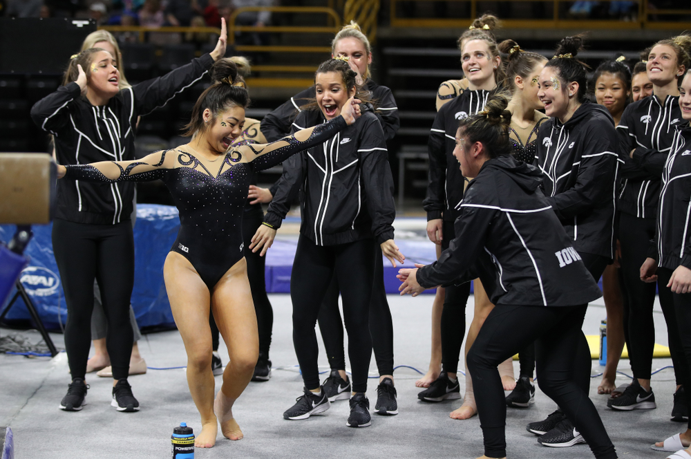 Iowa's Clair Kaji dances with her teammates during their meet against Southeast Missouri State Friday, January 11, 2019 at Carver-Hawkeye Arena. (Brian Ray/hawkeyesports.com)