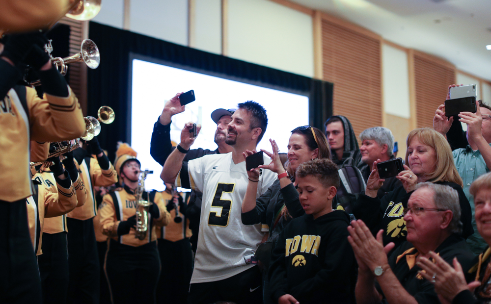 The Hawkeye Marching Band and the Iowa Spirit Squads perform during the Holiday Bowl Hawkeye Huddle Thursday, December 26, 2019 at the Hilton in downtown San Diego. (Brian Ray/hawkeyesports.com)