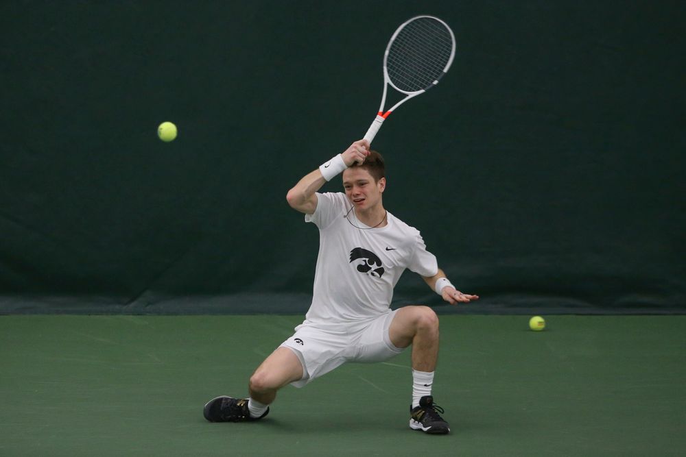 Iowa’s Jason Kerst returns a hit during the Iowa men’s tennis meet vs Nebraska on Sunday, March 1, 2020 at the Hawkeye Tennis and Recreation Complex. (Lily Smith/hawkeyesports.com)