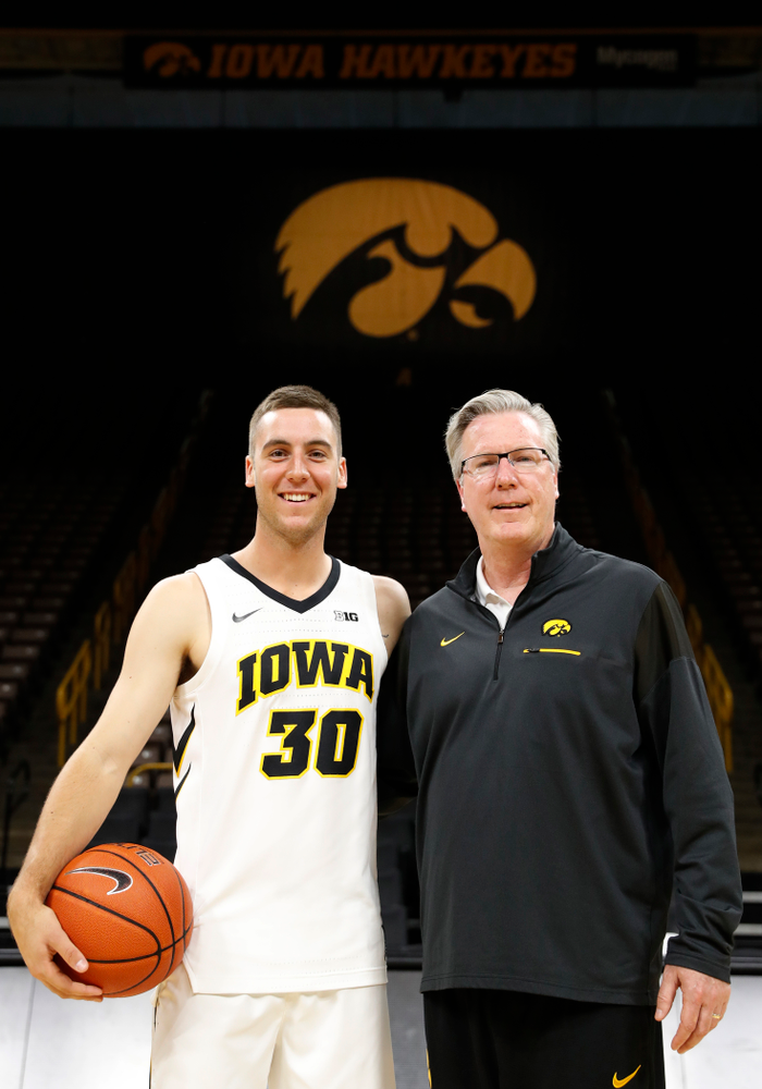 Iowa Hawkeyes head coach Fran McCaffery and guard Connor McCaffery (30) during the team's annual media day Monday, October 8, 2018 at Carver-Hawkeye Arena. (Brian Ray/hawkeyesports.com)