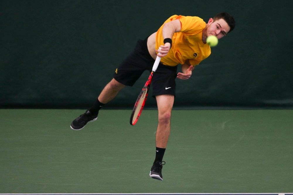Iowa's Jonas Larsen at a tennis match vs Drake Friday, March 8, 2019 at the Hawkeye Tennis and Recreation Complex. (Lily Smith/hawkeyesports.com)
